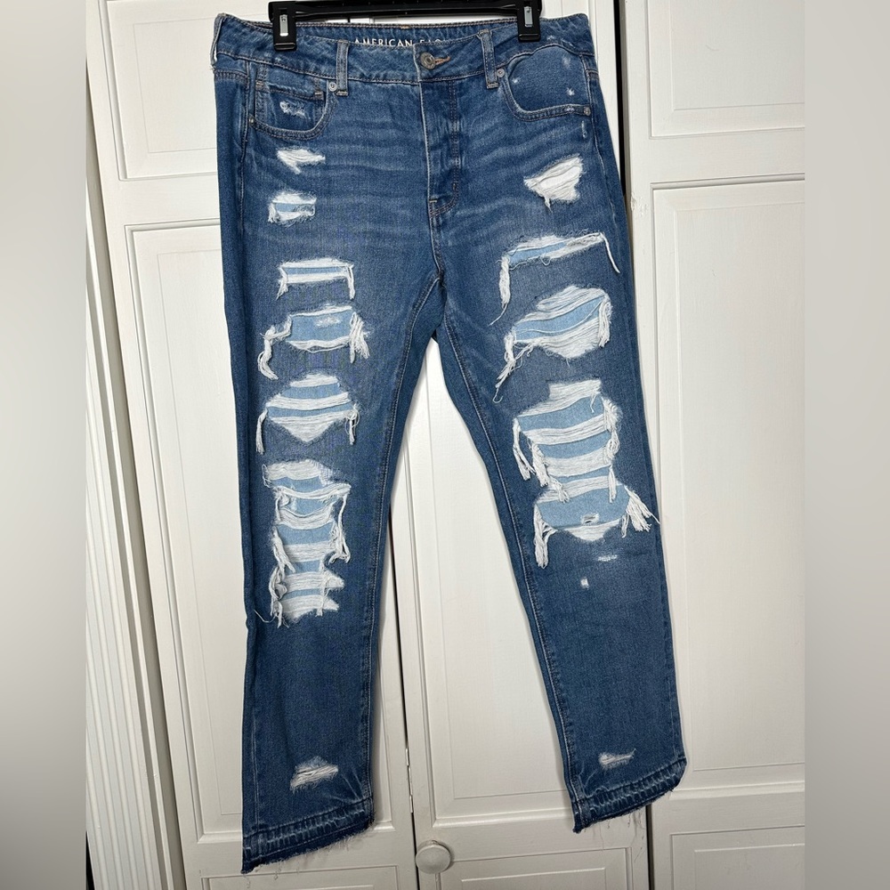 American eagle blue teased jeans size 8 mid-low waisted